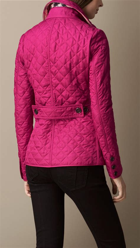 pink burberry jacket.